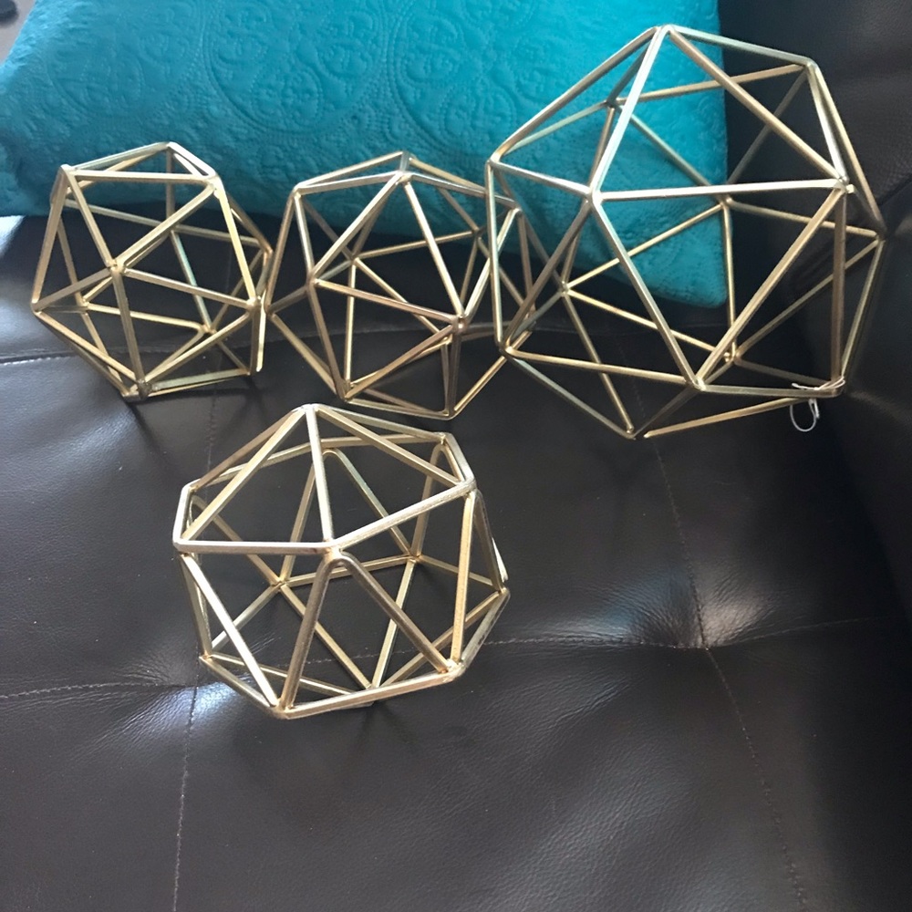Set of four goldtone spheres
